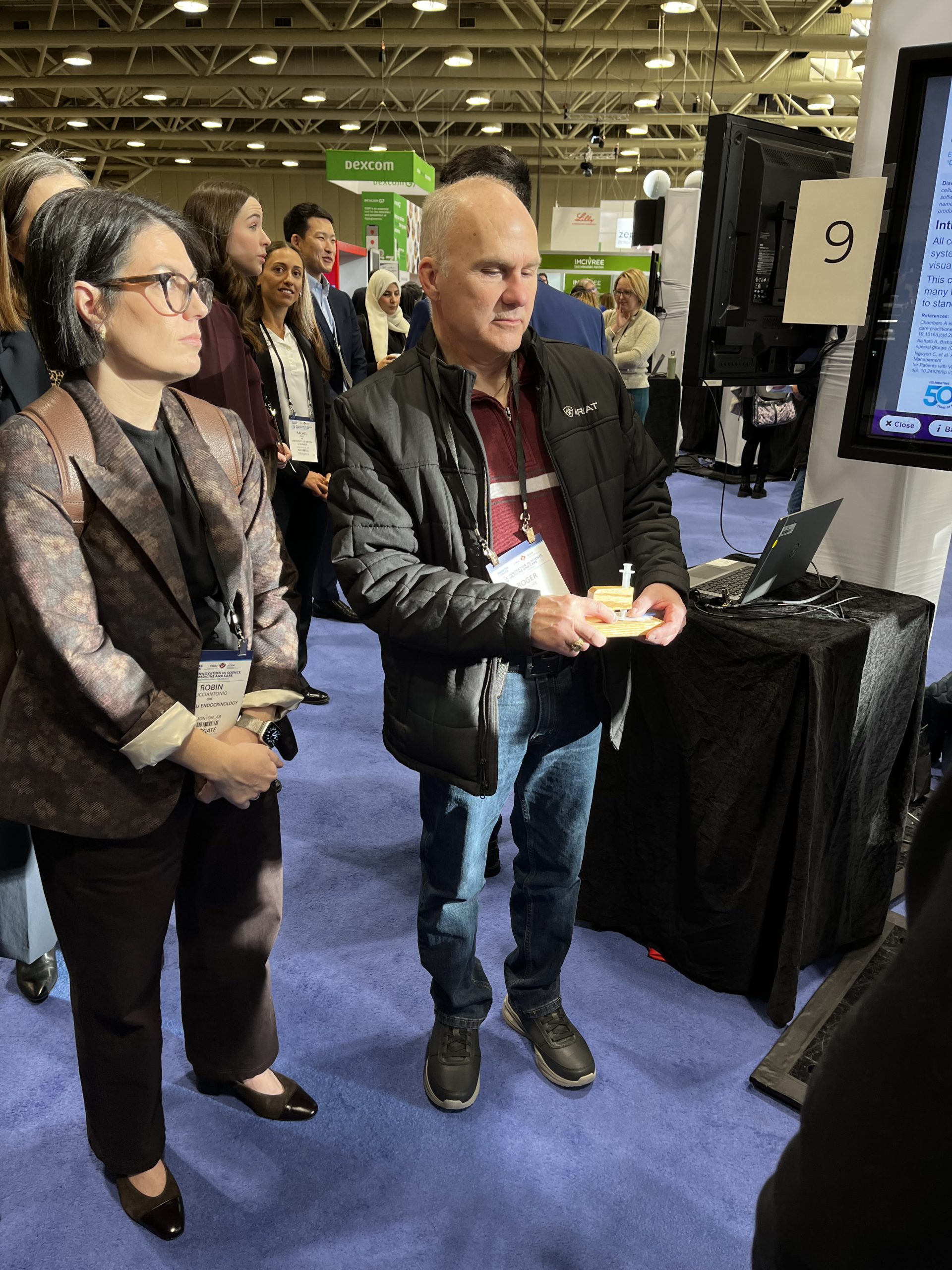 Roger demonstrating his tactile AID setup, operating the system non-visually.